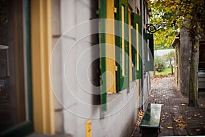 View on traditional Dutch houses and streets in a recreated heritage museum with beautiful historic vintage scenes from Holland.