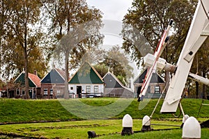 View on traditional Dutch houses and streets in a recreated heritage museum with beautiful historic vintage scenes from Holland.