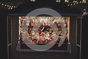 View of traditional famous annual Christmas Market in Senate Square of Helsinki, Finland, with kiosks, decoration, gifts and