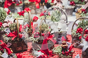 View of traditional famous annual Christmas Market in Senate Square of Helsinki, Finland, with kiosks, decoration, gifts and