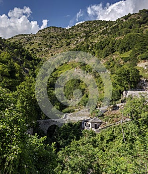 View of the traditional, Greek house in the village Syrrako and paved path Epirus, Greece