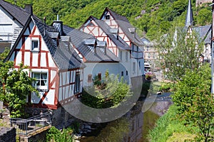 Half-timbered houses on the Elzbach in Monreal / Germany in the Eifel photo