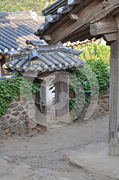 View of traditional korean courtyard gate and wall from itâ€™s joseon-era confucian academy. Byeongsan Seowon, Andong, South Korea