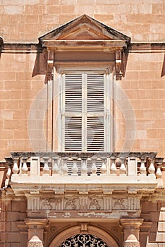 A view of traditional Maltese style open balcony in Mdina. Malta