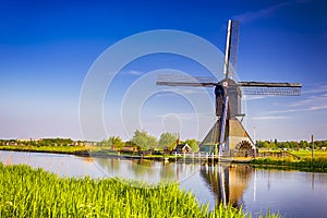 View of Traditional Romantic Dutch Windmills in Kinderdijk Village in the Netherlands Before Sunset