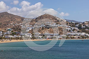 View of the traditional, white buildings in port, Ios, Greece