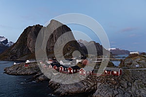 View of traditional wooden fishermen\'s huts at HamnÃ¸y in Lofoten, Norway photo
