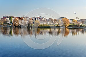 View of Traetskae Pradmestse or Trinity Suburb and Island of Tears Chapel or Island of Courage and Sorrow on Svisloch river bank