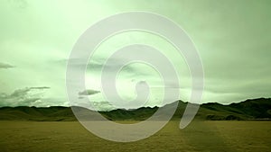 View from a train moving on the Tibetan plateau.