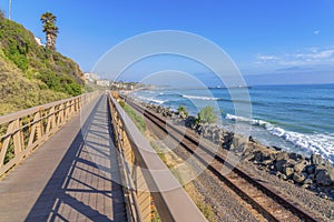 View of the train tracks and ocean from the bridge at San Clemente, California