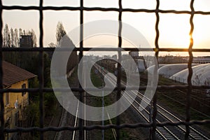 View of train tracks at sunset