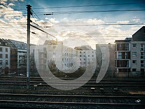 View from train window of parisian building early in the morning