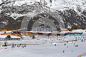 View of the training slope and the building of the ski school in the ski resort in the Pyrenees, Andorra