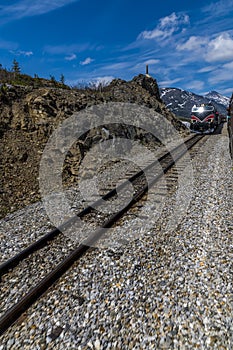 A view of trains passing at the high point of the White Pass and Yukon railway near Skagway, Alaska