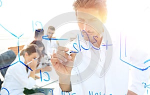 View through the transparent Board. scientist writes on the Boar