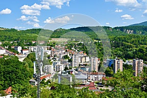 View of Trbovlje town and forest covered hills photo