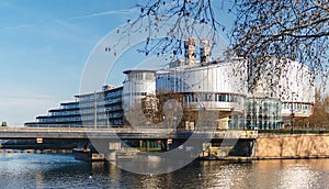 View through trees of the European Court of Human rights bulding