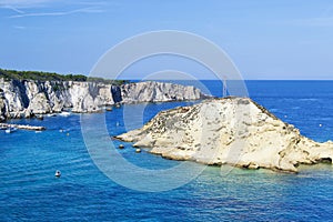 View of Tremiti islands with blue water, boats and clouds. Gargano. Puglia, Italy. for nature, travel and holyday concepts