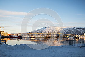 View of the Tromso bridge from the middle of the fjord
