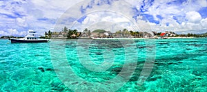 View of tropical island and resort from the sea. Mauritius vacation