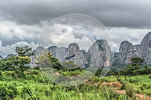 View of a tropical landscape, with forest and mountains Pungo Andongo, Pedras Negras , black stones, huge geologic rock elements