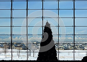 View trough a window of the Rocky Mountains