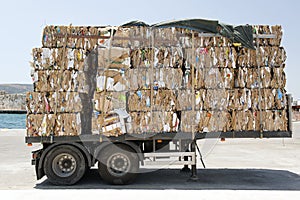 A view of a truck with recycled papers and cardboards in the customs of Kos, Greece