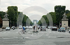 View of the Trumphal Arch in Paris from the Place de la Concorde through the Champs Elysees