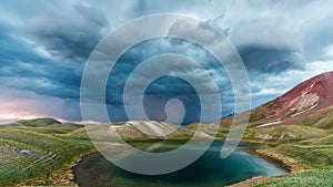 View of Tulpar Kul lake in Kyrgyzstan during the storm