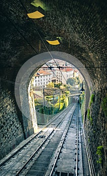 View from tunnel at morning light with funicular Railway in Citt