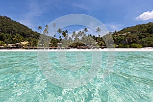 View from the turquoise waters to the beach on Pulau Redang