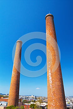 View of the two chimneys in Tagawa, Japan