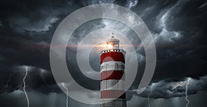 View on typhoon, hurricane, tornado, lighthouse and rain sky. Panoramic view of the stormy sky, lighthouse and dark clouds.