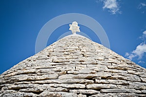 View of the typical conic roof of a trullo building. Alberobello,  Puglia. Italy