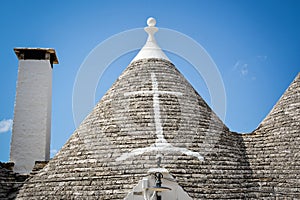 View of the typical conic roof of a trullo building. Alberobello,  Puglia. Italy