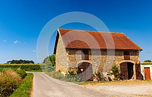 View of typical farmhouse in the landes countryside along Le Puy Route, France