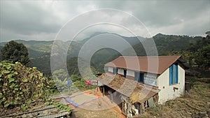 A view on a typical nepalese village. Landscape mountain view, house.