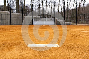 View of typical nondescript high school softball clay infield looking from pitching rubber