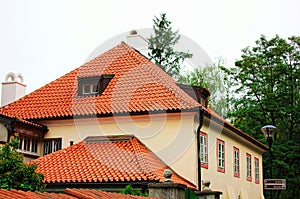 A view of typical Prague house with red tile roof