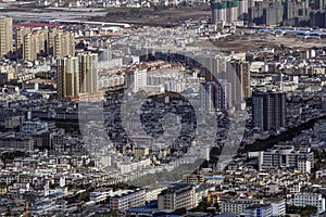 View on typical smaller Chinese city with old low height architecture