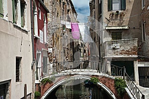 A view of a typicial canal in Venice. taly