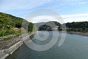 View of Uji river in the neighborhood of historical Byodo-in temple in Uji city, near Kyoto, Japan