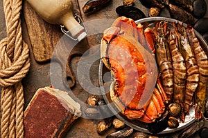 View of uncooked crab, shellfish, cockles