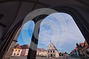 View from under the arcades on town hall square in Bardejov town during summer