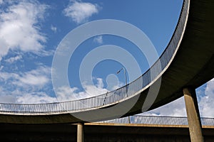 View under curvature concrete bridge.