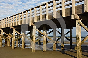 View Underneath A Wooden Bridge Over the Bay in Duxbury