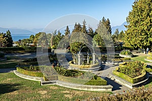 View of University of British Columbia(UBC) Rose Garden at sunny day with mountains in the background, Vancouver, Canada