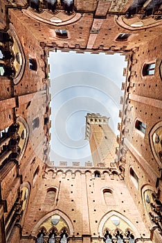 View up from Cortile del Podesta, Courtyard of Palazzo Pubblico in Siena. Italy photo