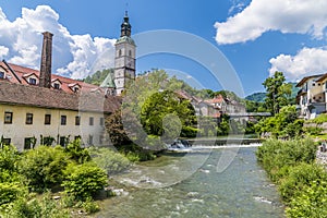 A view up the Selca Sora river past the weir in the old town of Skofja Loka, Slovenia