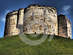 View up the steps on the motte to the ruins of the stone medieval Norman keep of York Castle known as Cliffords Tower